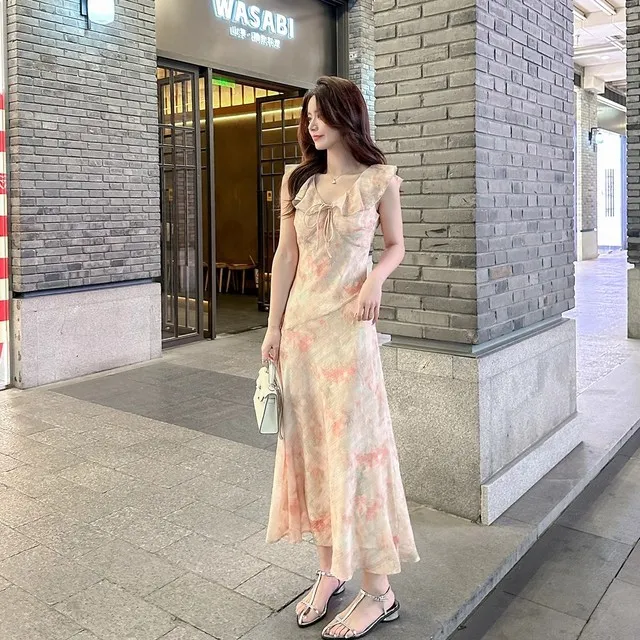 覆古V领碎花洋装女2025夏季新款荷叶边收腰显瘦海边度假风长裙