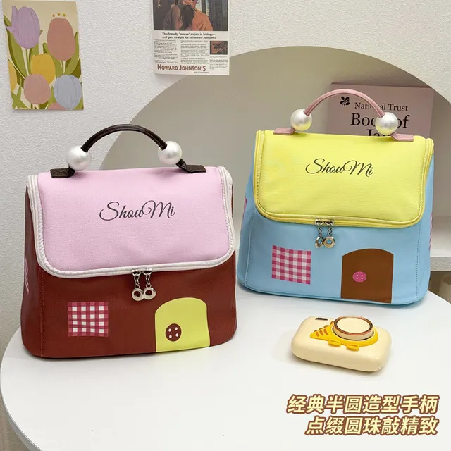 2025热卖新款可爱小房子女手提式便携旅行大容量防水收纳化妆包