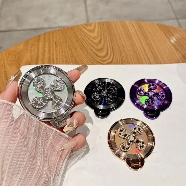 【惊爆价】风生水起旋转解压手机支架背贴卡通可爱电镀手机贴商品图