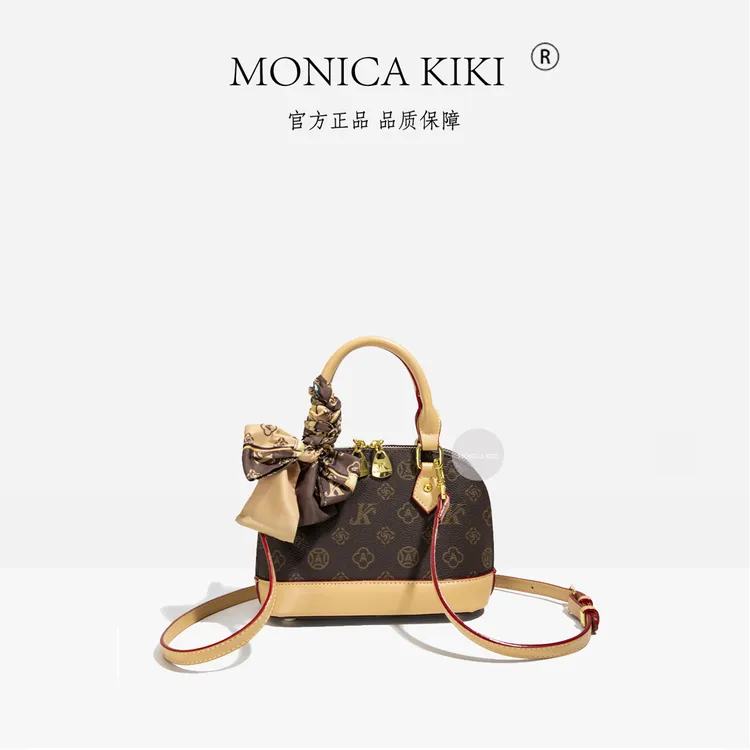 MONICA KIKI/莫妮卡奇奇轻奢潮流贝壳女士包时尚新款百搭轻奢经典