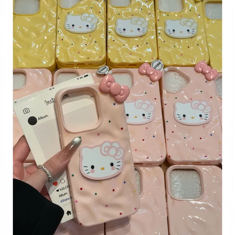 欧克里里彩色墨点kt蝴蝶结苹果16Promax褶皱手机壳15/14女1312/11