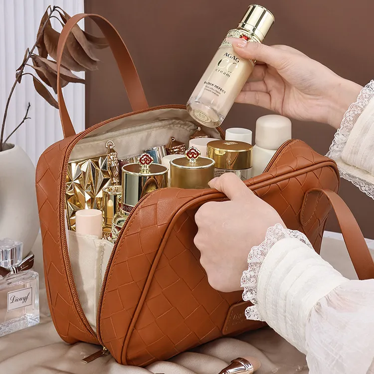 新款复古大容量月半弯手提高颜值化妆包旅行编织格化妆品洗漱收纳