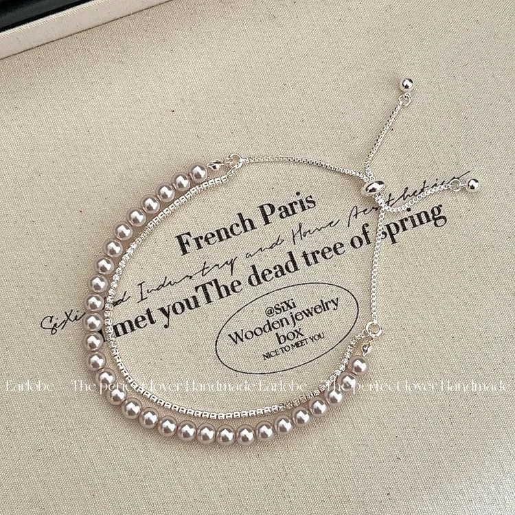 合成金属亚克力手链 曼塔玫瑰色珍珠手链抽拉款设计东