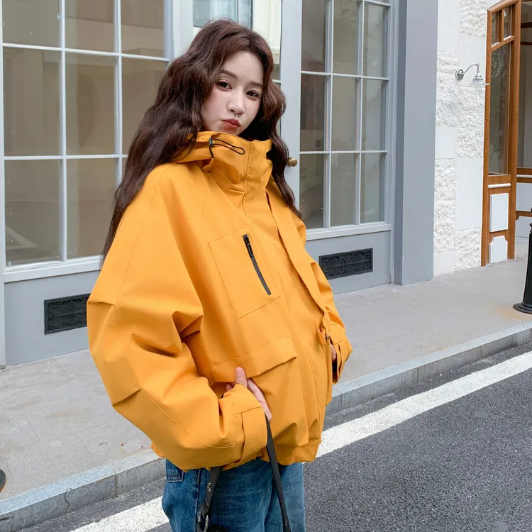 橘黄色韩系冲锋衣羽绒服女2025冬季新款高级感连帽短款工装厚外套