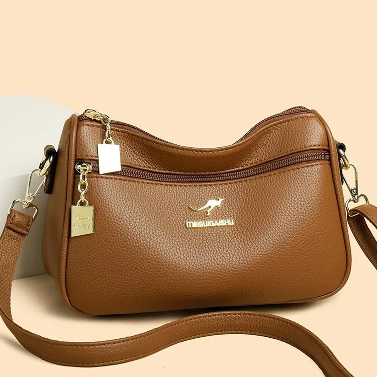 袋鼠大容量斜挎包女包2025新款时尚百搭女士真皮中年妈妈包单肩包
