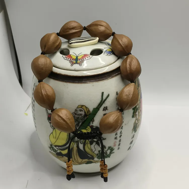 原皮橄榄核手串一串11颗尺寸1.6至1.7*2.2-2.3左右