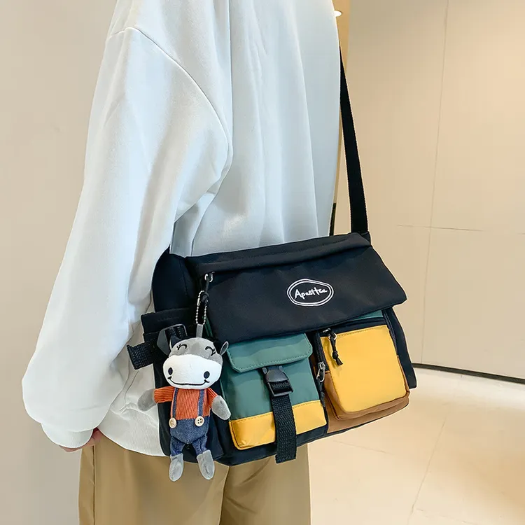 ins撞色斜挎包新款潮牌拼色单肩包女休闲运动潮酷邮差包日系男款