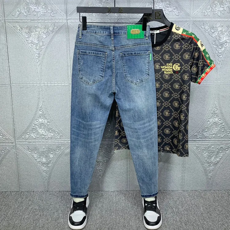 高档牛仔长裤男修身秋季新款时尚潮流休闲帅气百搭蓝色小脚九分裤