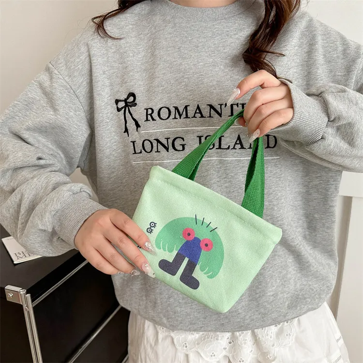 女孩学生韩版小包包卡通时尚手提包少女零钱包便当包饭盒包日