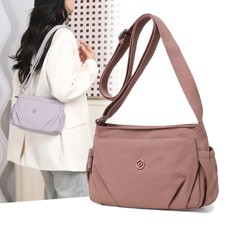 女包多层斜挎包新款超轻便简约帆布小包休闲百搭牛津布单肩女士包