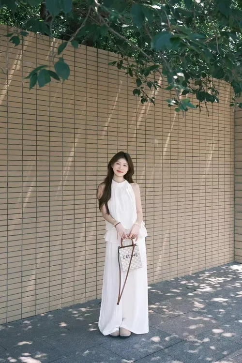 2025夏季新款法式气质无袖荷叶边挂脖背心上衣宽松阔腿长裤子套装