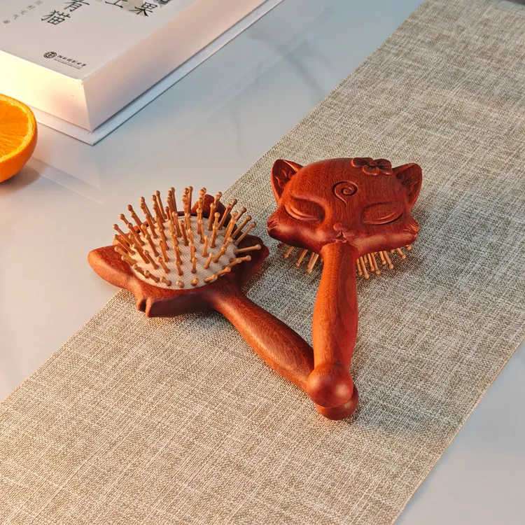 红檀香气垫梳招桃花卡通可爱气垫梳小巧便携气囊按摩梳