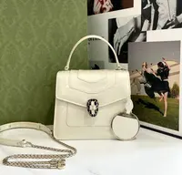 99新 BVLGARI/宝格丽 珠光白 蛇头漆皮风琴包 99新/8028