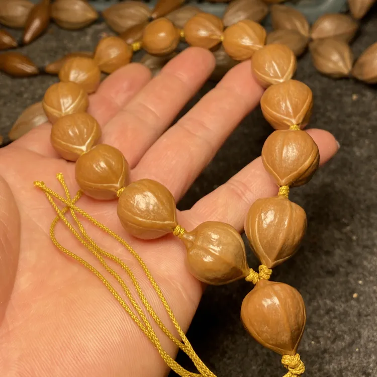 橄榄核铁核1.7正圆手持原皮正圆手串蜜桃臀长串