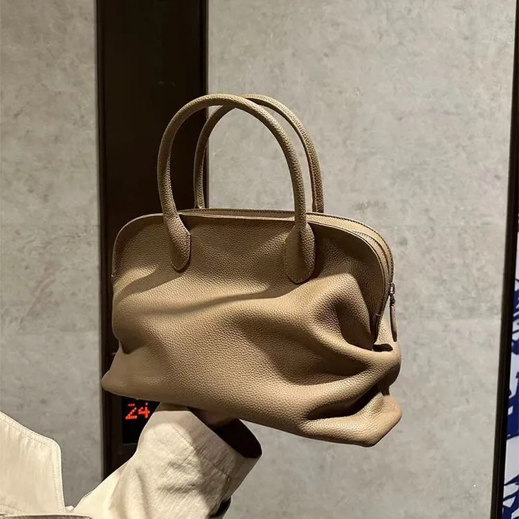 小众软牛皮手提贝壳包2025新款极简风真皮大容量单肩斜挎保龄球