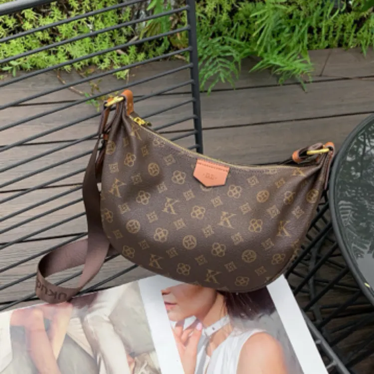 优库迪斯UK女包96668爆款饺子包高级感轻奢复古时尚单肩斜挎包