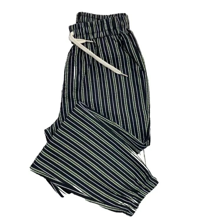 LM9937夏季薄款泡泡棉松紧腰洋气条纹九分休闲裤