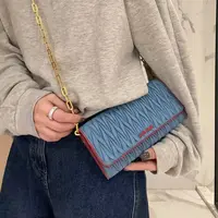 95新 MIU MIU/缪缪 【蕾】 04 0122 蓝色褶皱翻盖单肩包