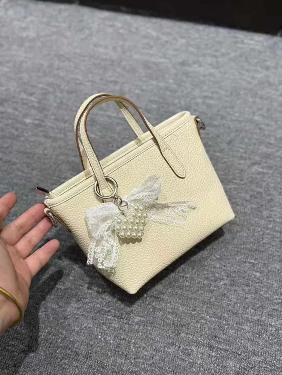 【饰菲时尚】多芭安糖果色手提菜篮子蕾丝挂饰清新洋气小众斜挎包