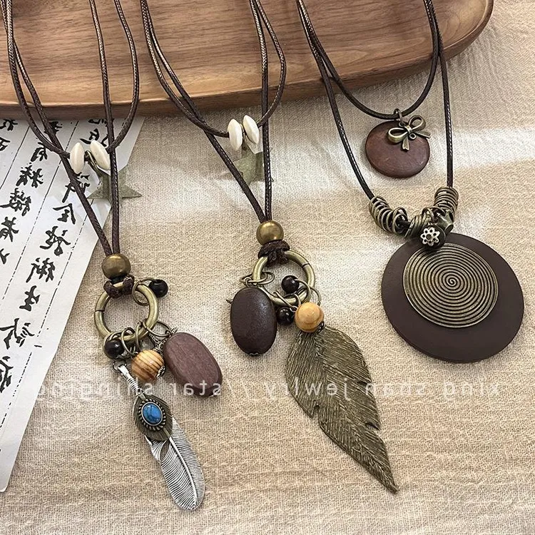 钛钢锆石项链 禅意长款羽毛项链女复古民族风叠戴新款波西米亚配