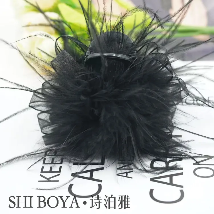 羽毛抓夹黑色显发量女后脑勺毛毛新款高级感鲨鱼夹头饰时尚款式