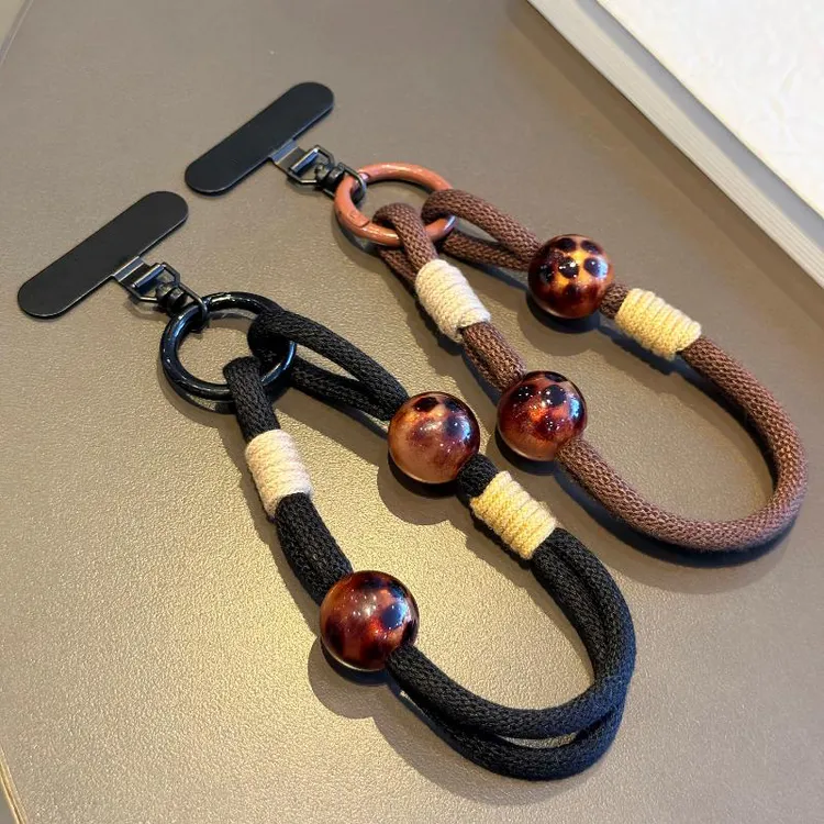 高端黑豹纹珠手机挂绳斜挎可背编织结实手腕防丢带垫片壳手机链