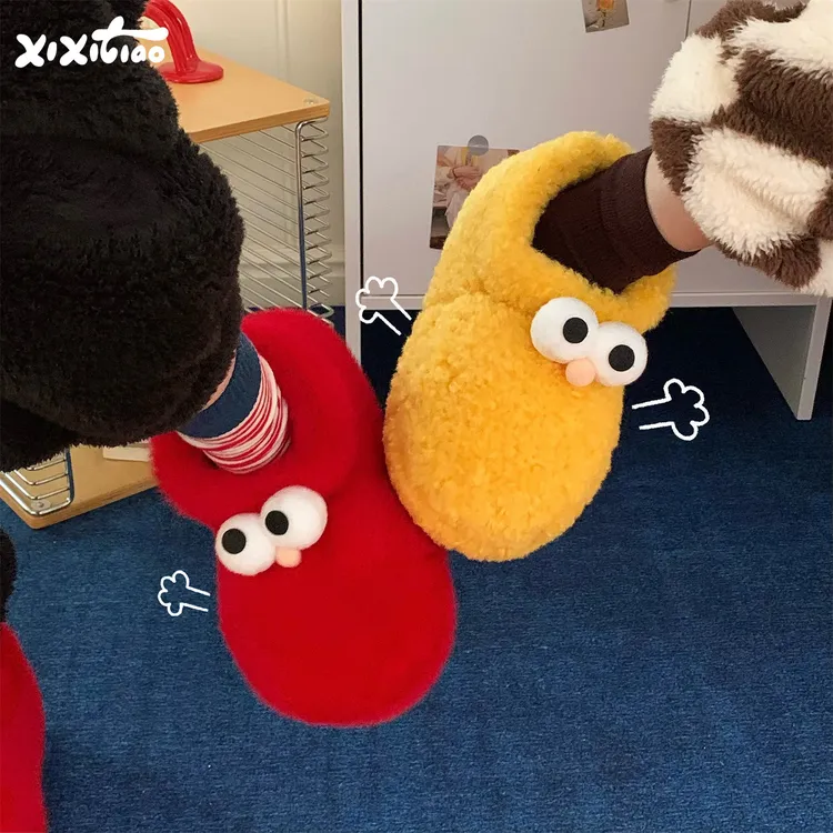 细细条 趣味大眼睛户外保暖毛毛靴子女冬防滑可爱大头短筒棉鞋ins