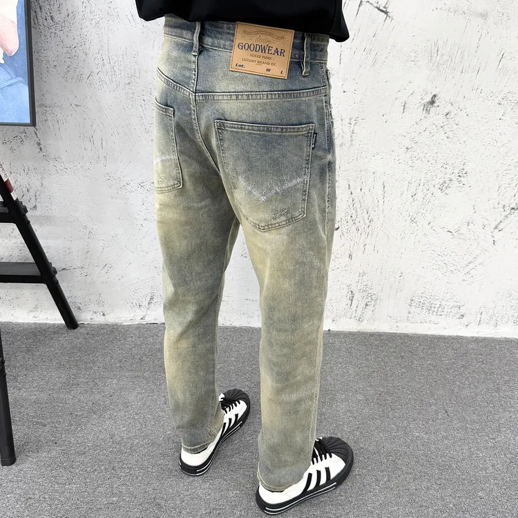 美式复古水洗做旧微锥牛仔裤男秋冬高品质宽松百搭痞帅刺绣小脚裤
