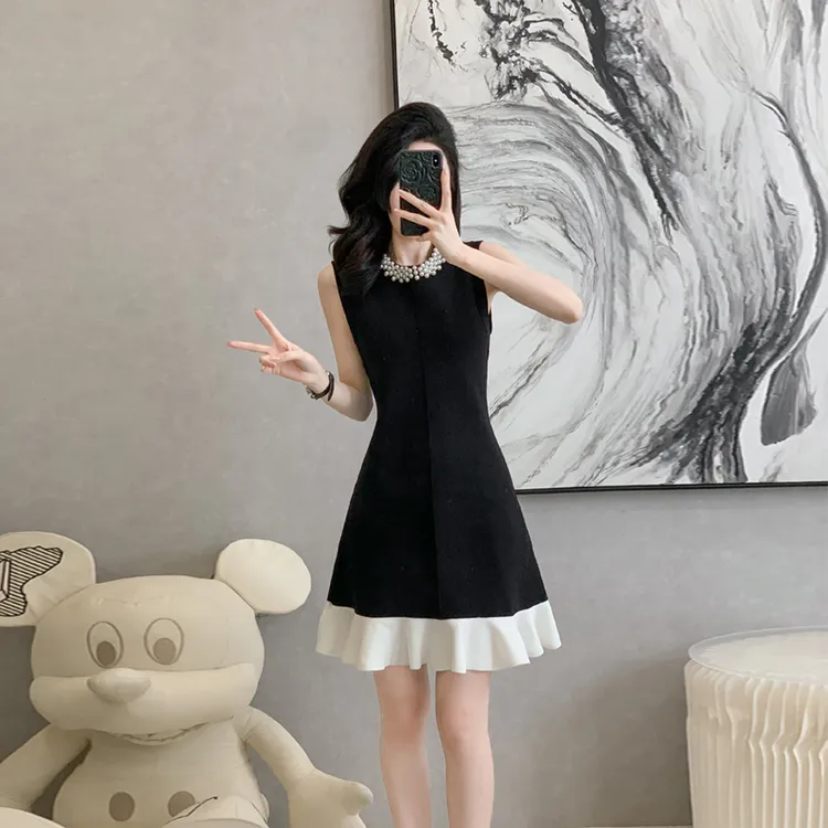 小香风重工珍珠领黑白撞色荷叶边连衣裙女夏法式名媛赫本风小黑裙