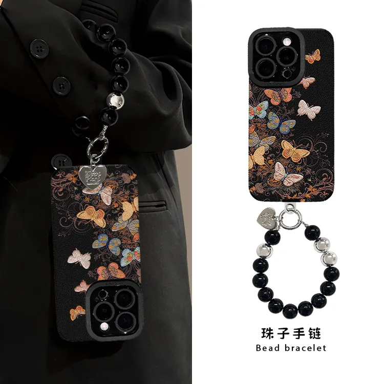 彩色蝴蝶适用苹果17华为vivo/oppo小米17iPhone16瞳眼羊皮手机壳