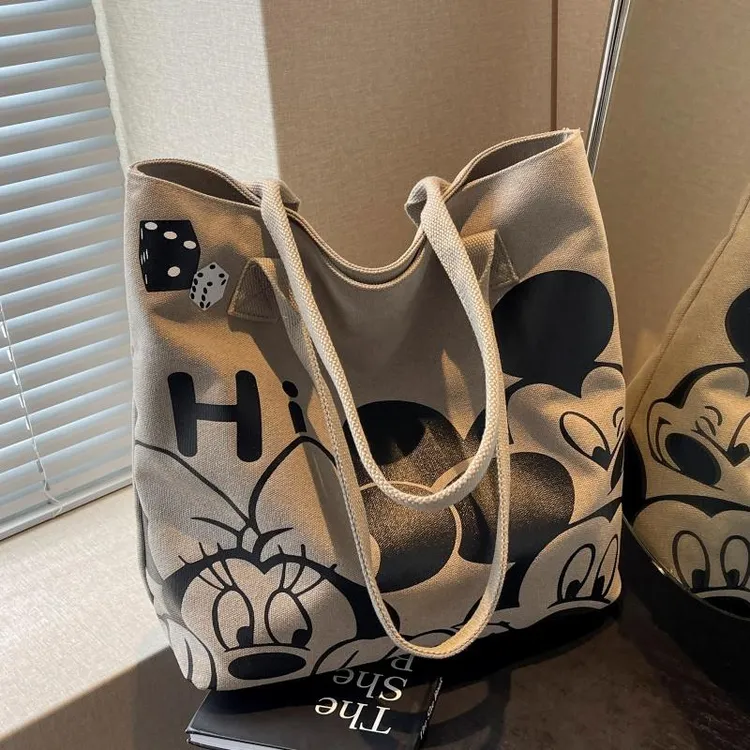 日系卡通帆布包包女2025新款大容量学生上课手提袋通勤单熊猫原创