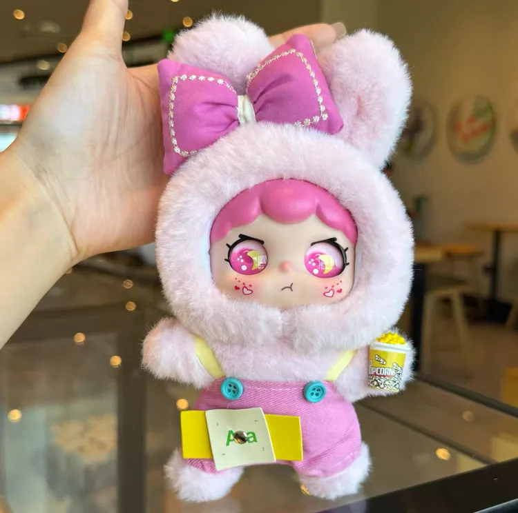 新款可爱搪胶脸毛绒玩具公仔创意潮玩萌兜兜书包包挂饰钥匙扣玩偶