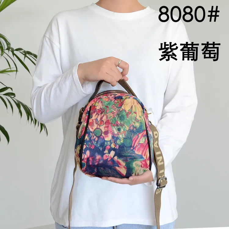 2025年春季新款大容量斜挎包简约便携布包妈妈女式单肩斜挎包防水