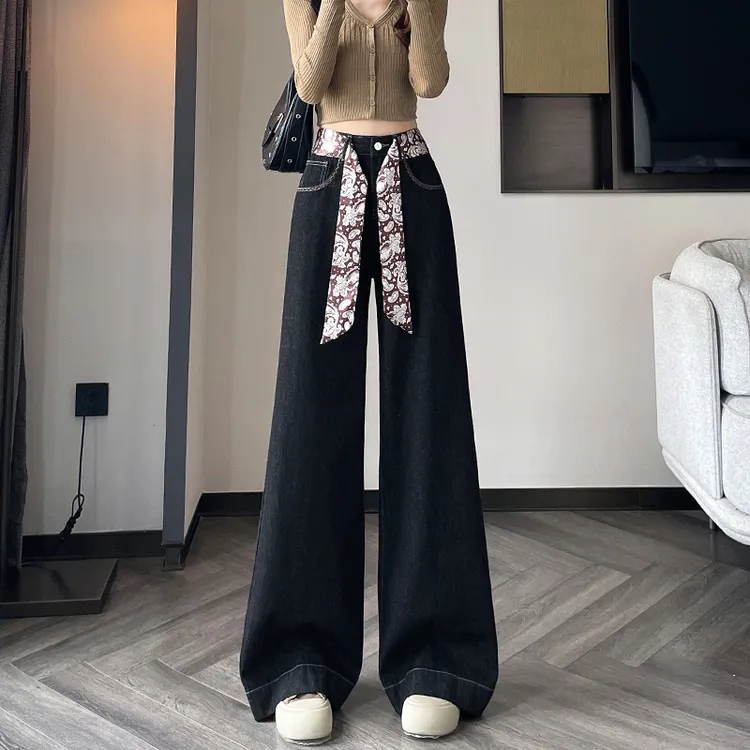 黑金色宽松阔腿牛仔裤女2025秋季新款超火丝带遮肉大喇叭拖地裤子
