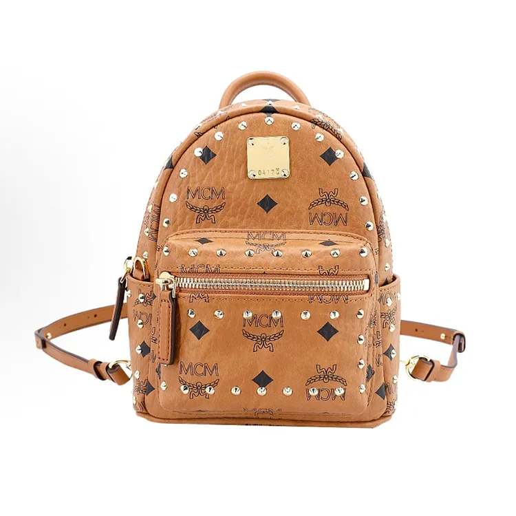 95新 MCM 干邑色超mini双肩包经典铆钉轮廓老花满印双