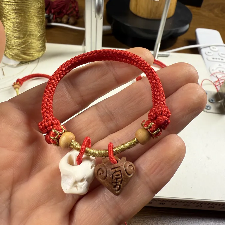 新生婴儿长命百岁桃核桃木珠猪惊骨宝宝八股编红绳手绳防惊吓