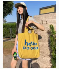 2025年四季新款字母印花单肩帆布包大容量学生潮流托特女包购物袋