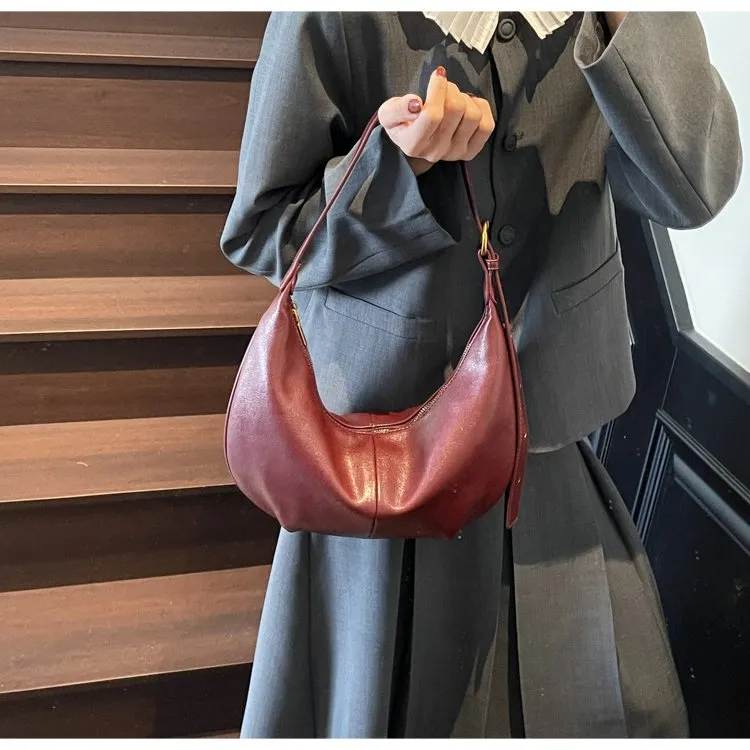 法式腋下包高级感小包2025新款潮小众设计包包通勤单肩斜挎饺子包