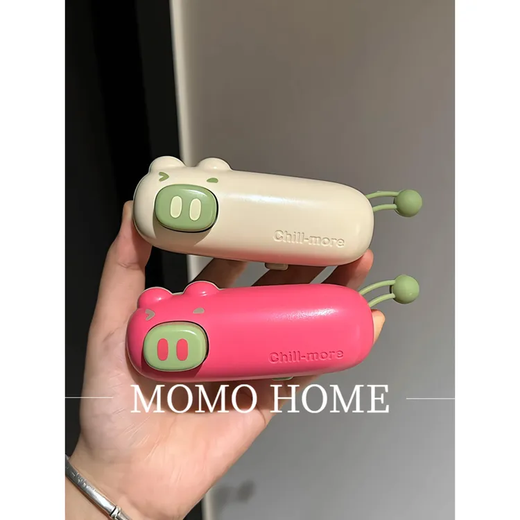 MOMO多巴胺封口器家用迷你便携式手持雪花酥机小型封包装袋封口机