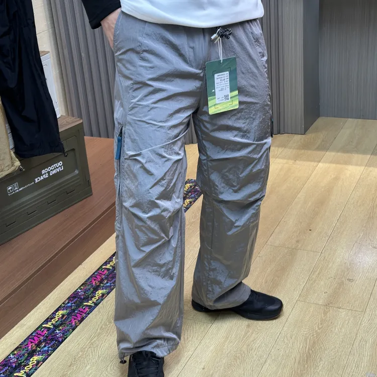 4D金属尼龙面料情侣款防风防泼水加厚保暖玉米格绒冲锋裤伞兵裤冬