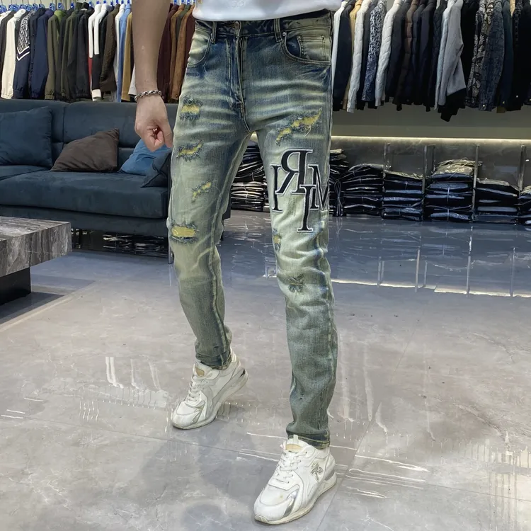 【也许家】新品男士破洞刺绣欧货修身小脚牛仔裤个性时尚长裤CC1294