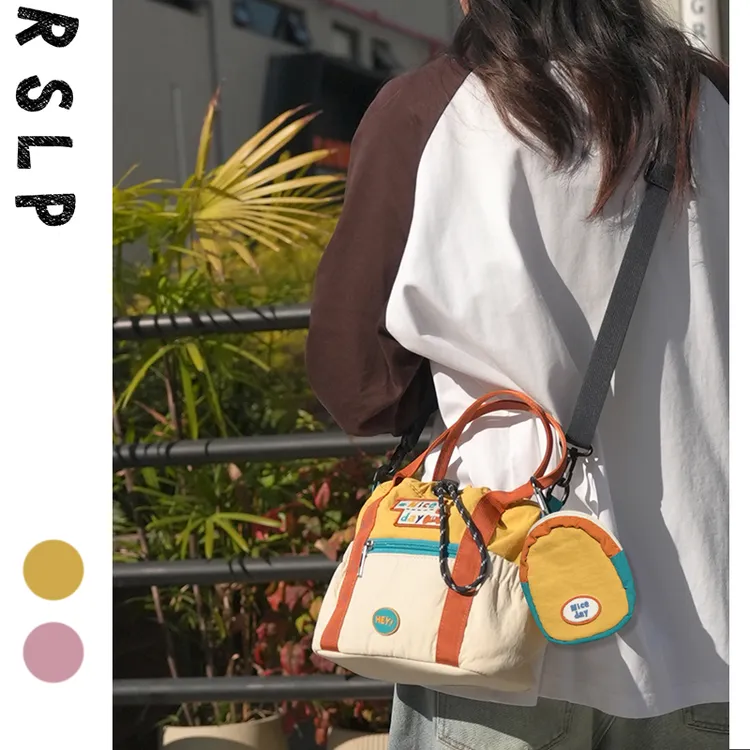 若素良品原创可爱撞色云朵单肩手提斜挎水桶包摄影轻便相机收纳包