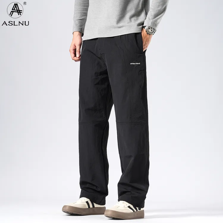 美式户外登山防风防水冲锋裤伞兵裤机能工装裤伐木裤宽松直筒黑色