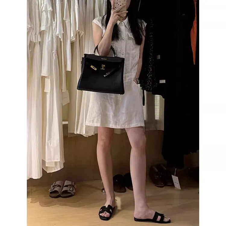 韩系休闲白色亚麻连衣裙女款2025夏季新款时尚无袖显瘦工装连衣裙