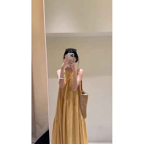 2025夏季新款气质高级感法式长裙独特漂亮度假风黄色吊带连衣裙女