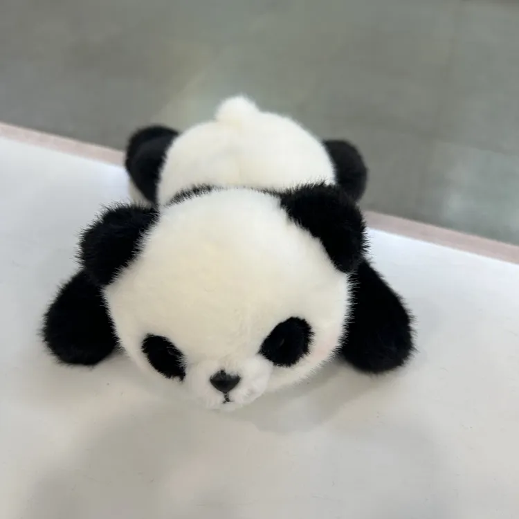 可爱的粉红熊猫掌中宝