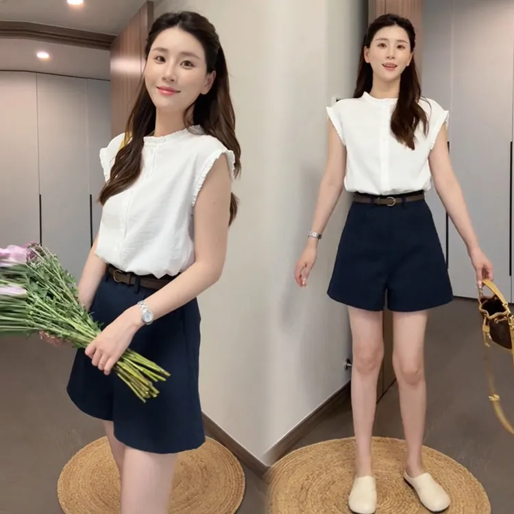 超火夏季穿搭一整套女2025新款白色飞飞袖衬衫高腰阔腿短裤两件套