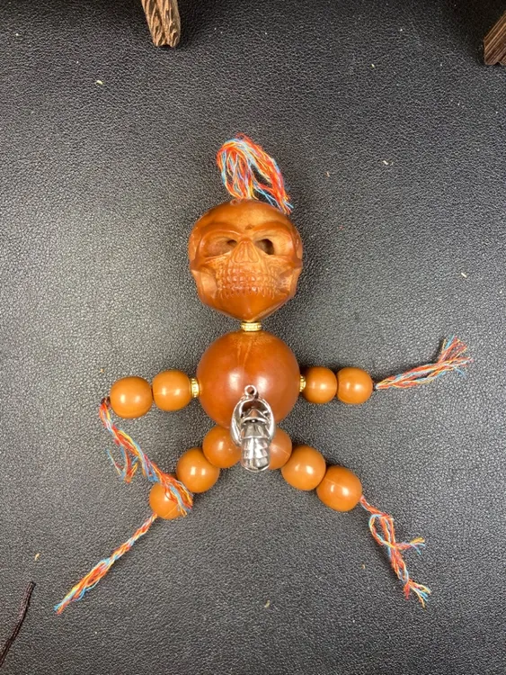骷髅小人负心汉巴西大橄榄核生命手把件文玩
