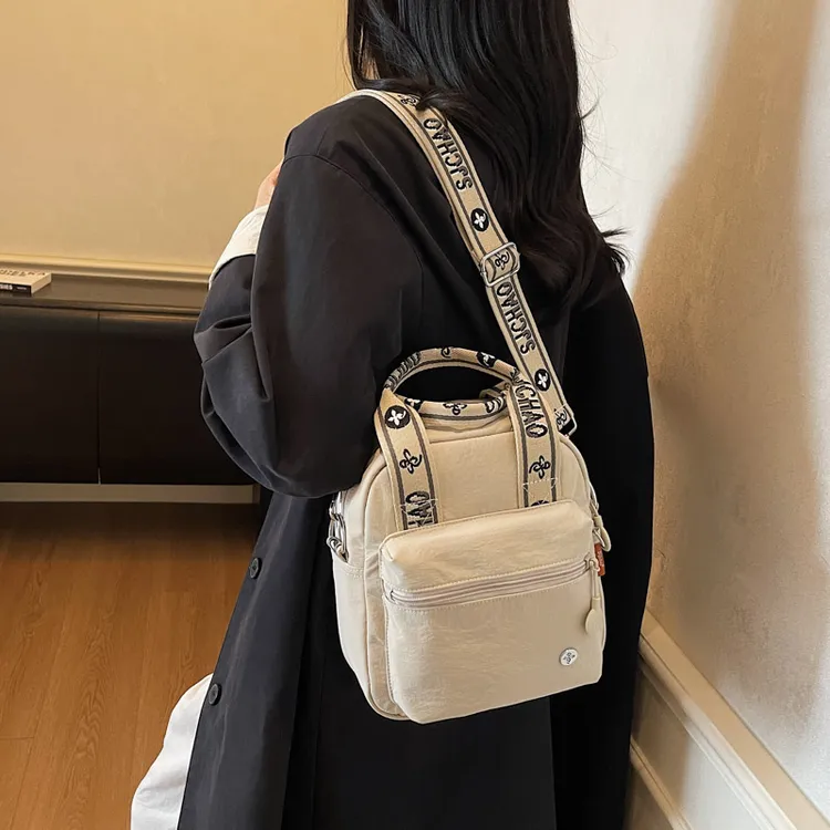 休闲竖款单肩包网红男女同款随身包纯色斜跨包简约风洋气功能包包