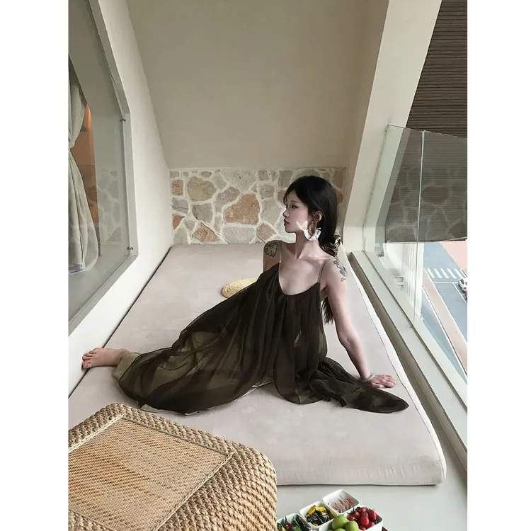 优秀的金蘑菇绿野仙踪不规则设计感度假大裙摆气质清冷吊带连衣裙